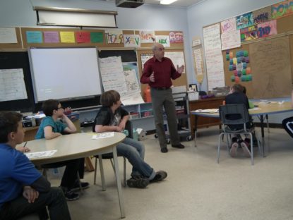 Hatchery member Bruce Campbell teaches a series of lessons about the hatchery, fish habitat, ecology and conservation